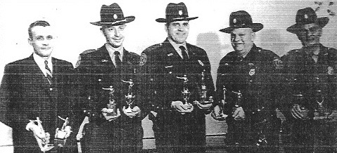 An awards ceremony of the Madeira Police Department in the early 1960's includes, from left: Tom Gerth, chief; John Gary, Don Wallace, Russell Ward, and Cap Bowman.